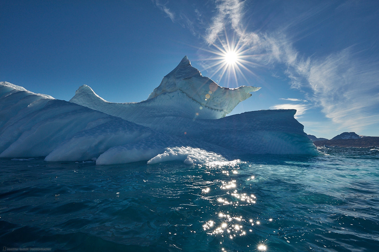 Sermilik Fjord Iceberg with Sunburst