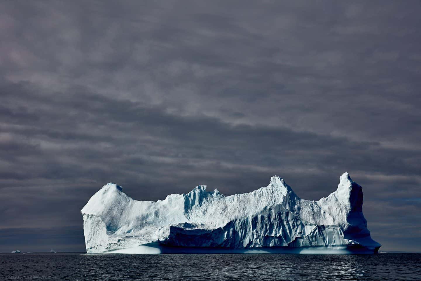 Iceberg with Heavy Sky