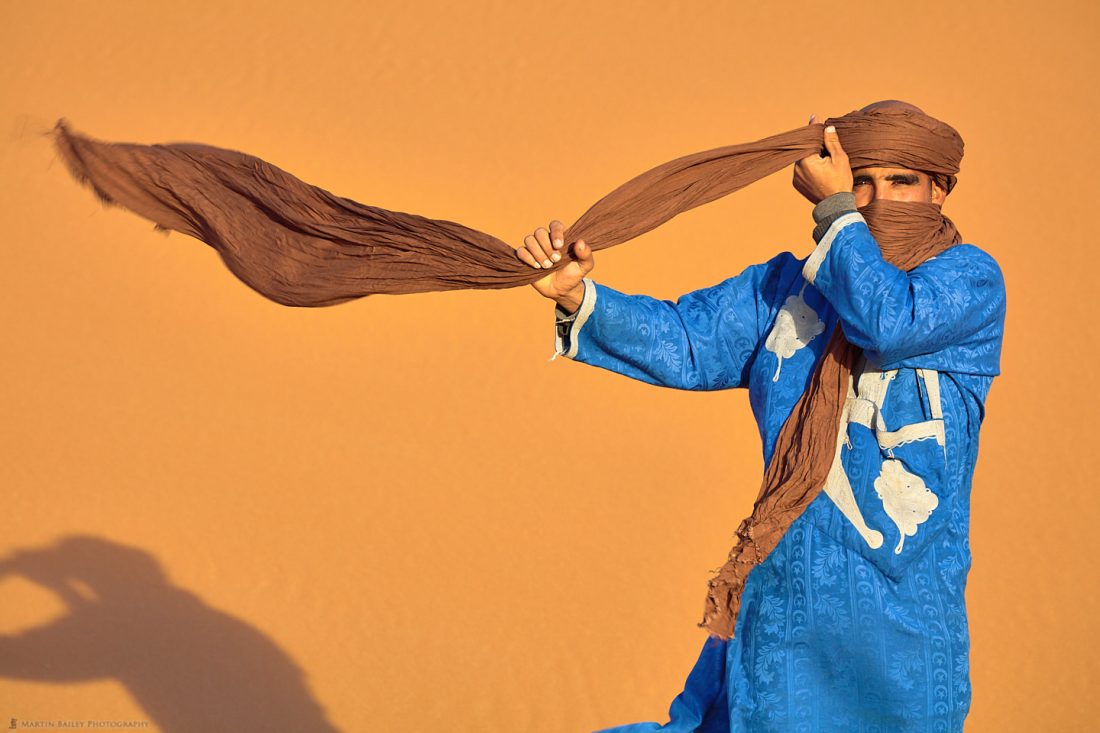 Young Moroccan Man Tying Turban