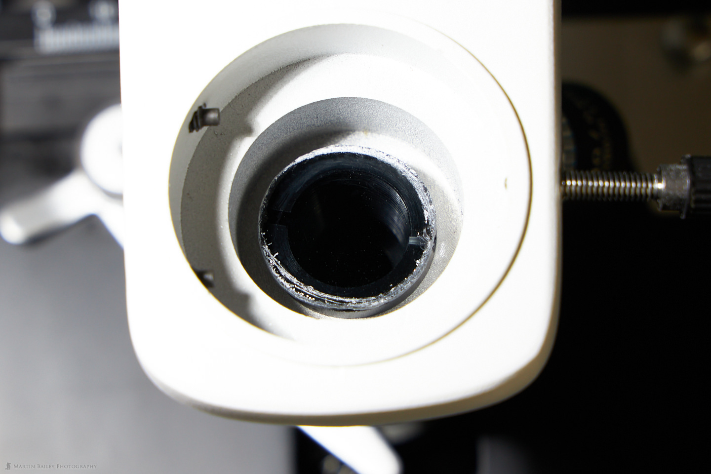 Second Polarizer Between Objective Lens Turret and Head
